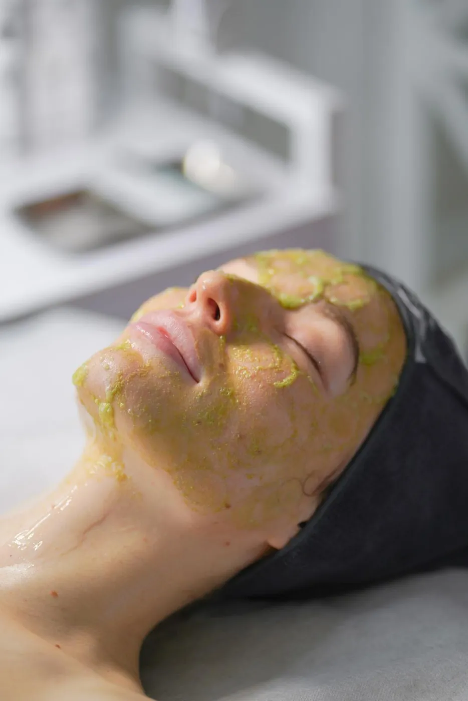 Golden enzyme mask application during a Deep Cleansing Facial at SI Glam Glow